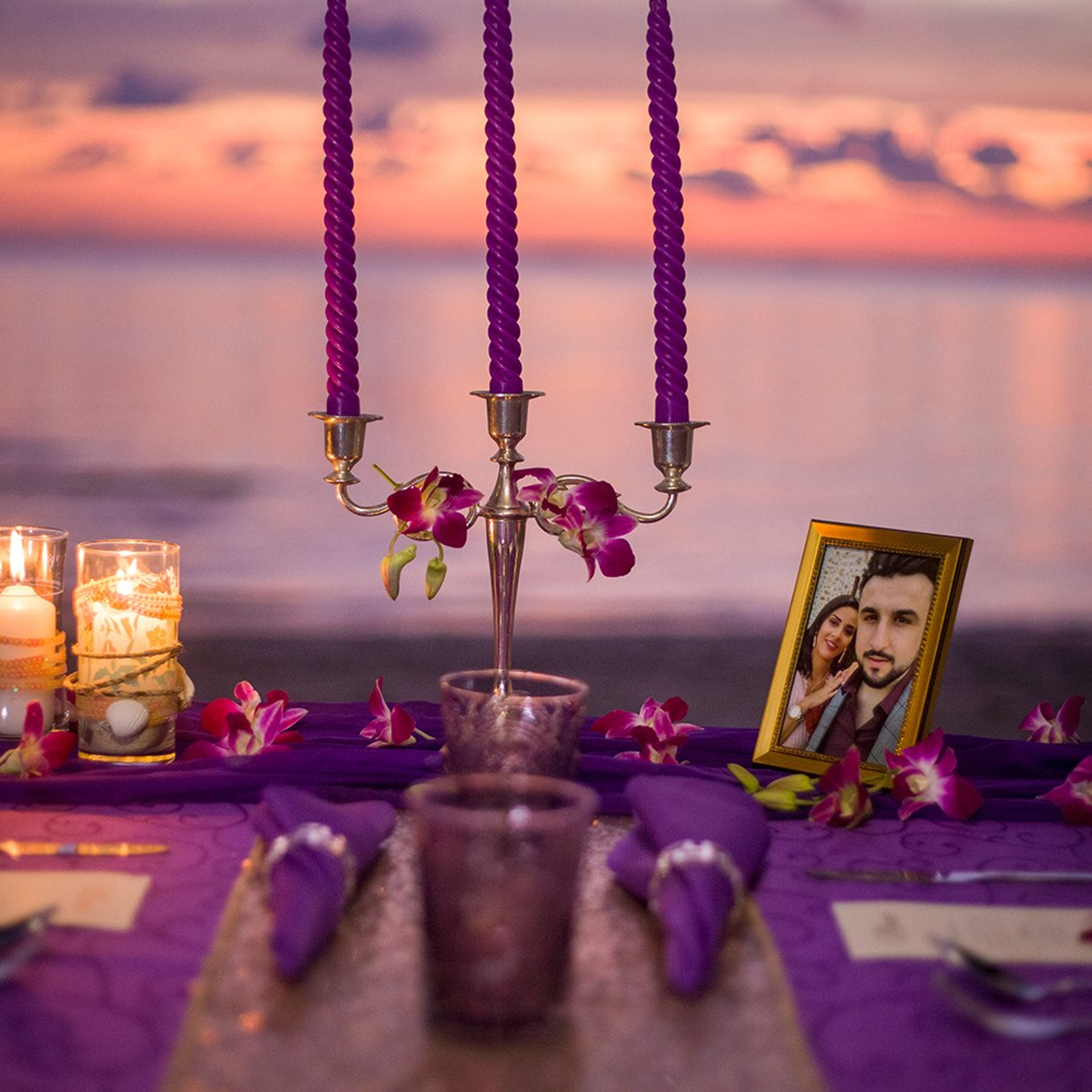 Luxury beach proposal in Koh Samui, Thailand. Private sunset setup with candles, flowers, and ocean view for an unforgettable engagement experience.