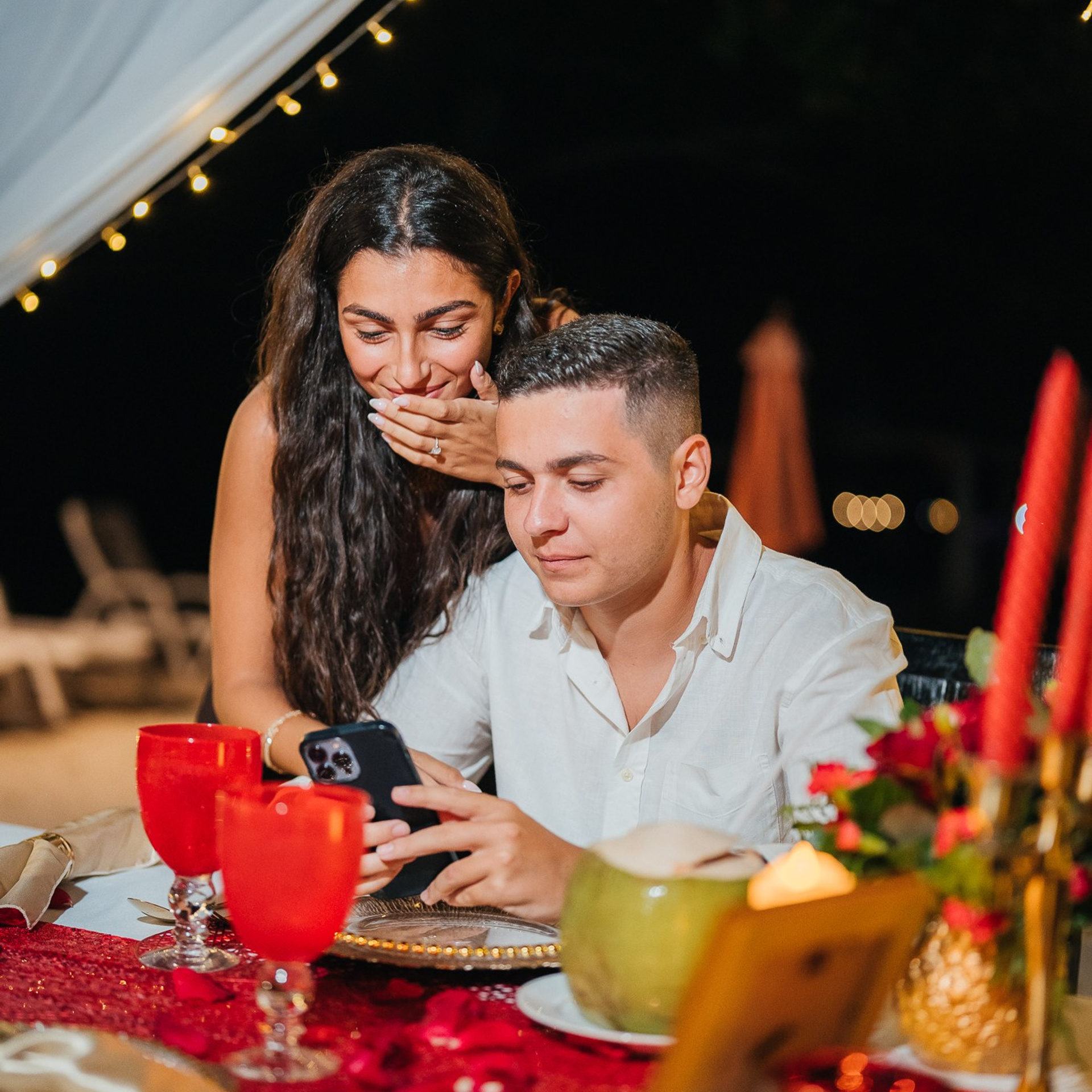 Luxury beach proposal in Koh Samui, Thailand. Private sunset setup with candles, flowers, and ocean view for an unforgettable engagement experience.