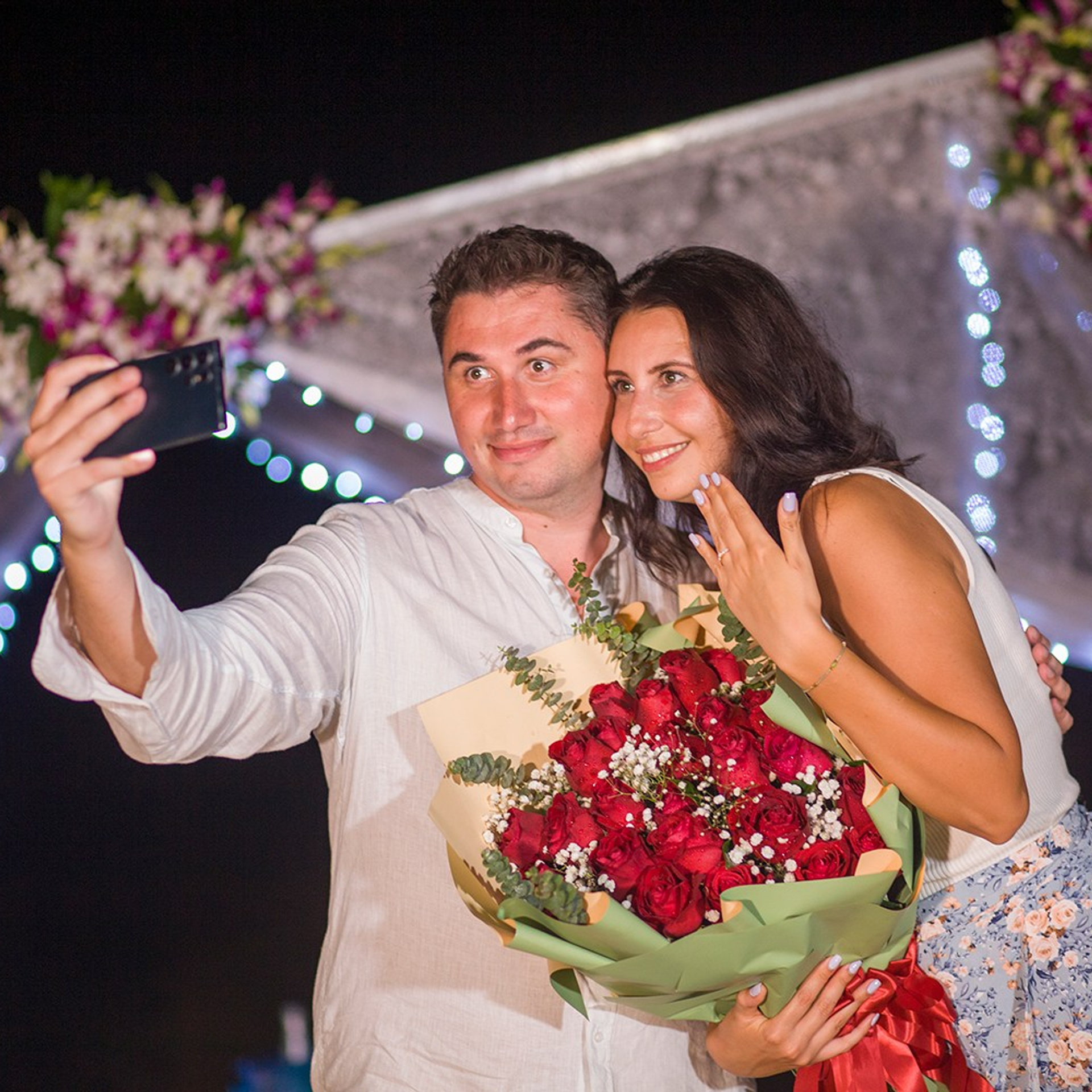 Luxury beach proposal in Koh Samui, Thailand. Private sunset setup with candles, flowers, and ocean view for an unforgettable engagement experience.