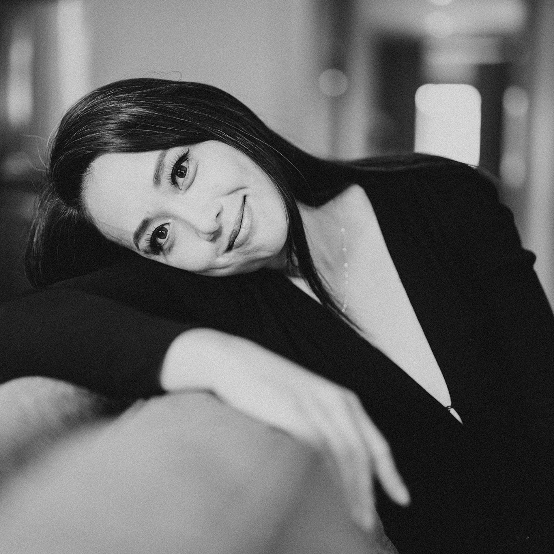 Black and white artistic portrait of woman in black blazer - portrait photographer Mexico City