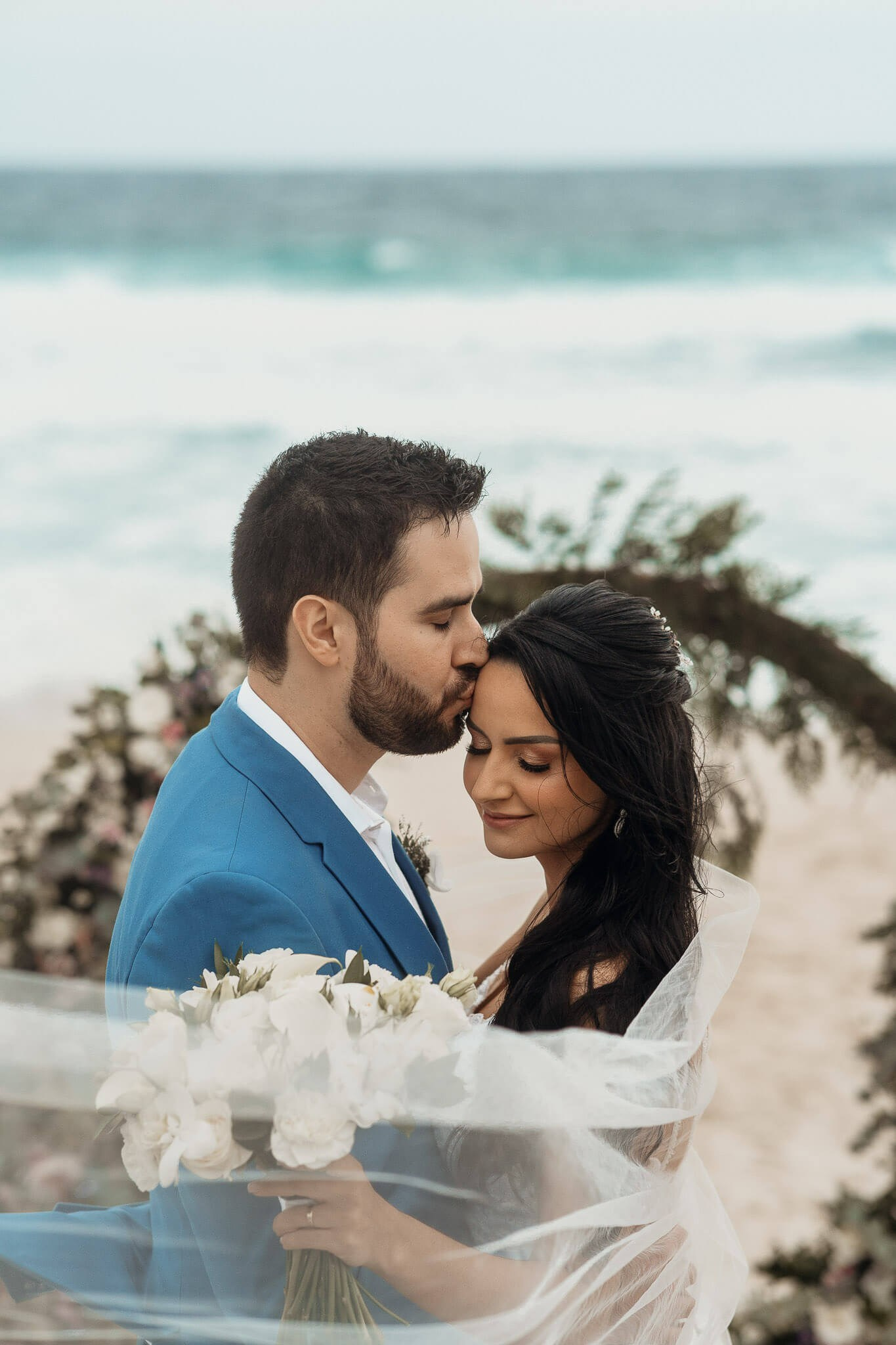 Bride and groom celebrating destination wedding in Rio de Janeiro, romantic Brazil wedding photography.